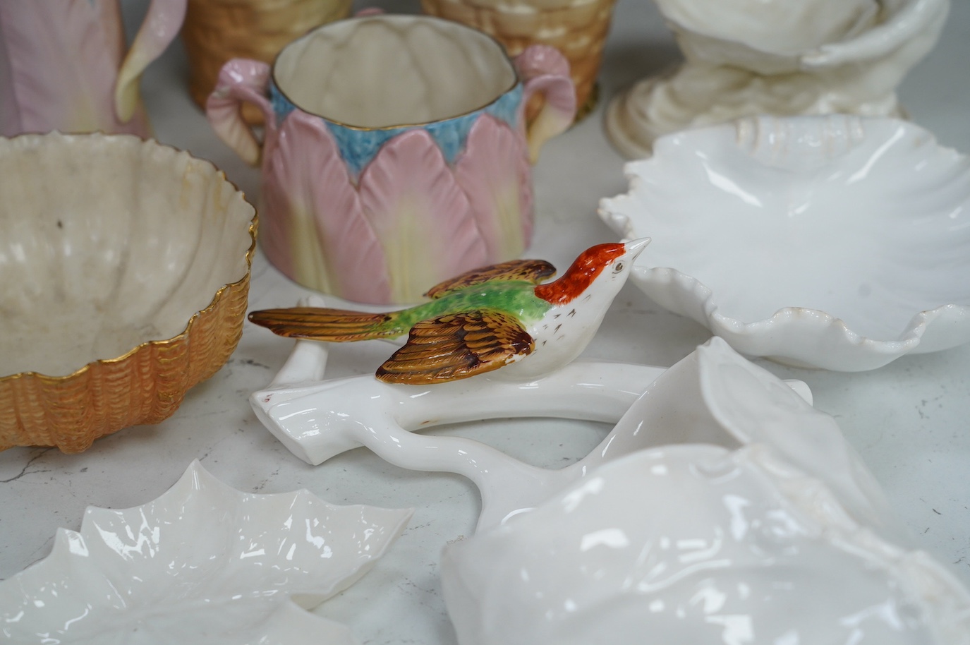 A group of Royal Worcester and Grainger tableware and a bird wall pocket, 29cm (9). Condition - fair to good